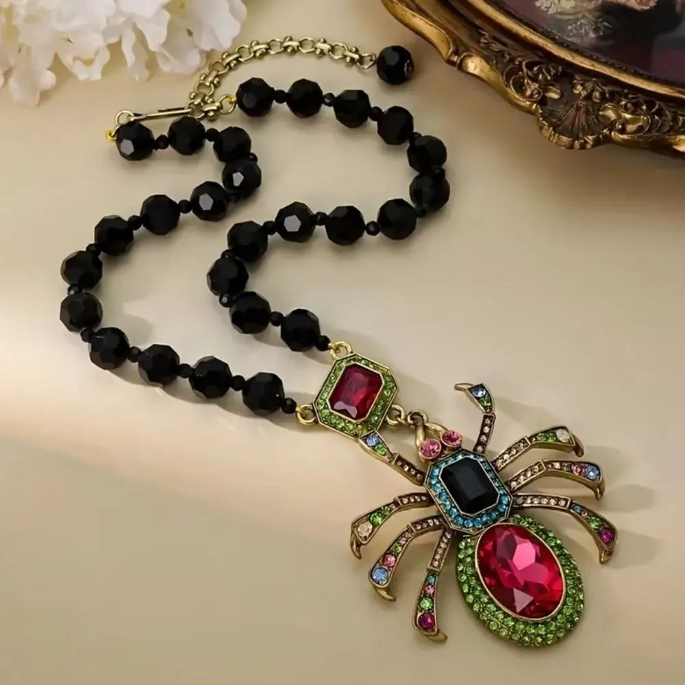 Vintage Black and Gold Spider Necklace with Red and Green Accents